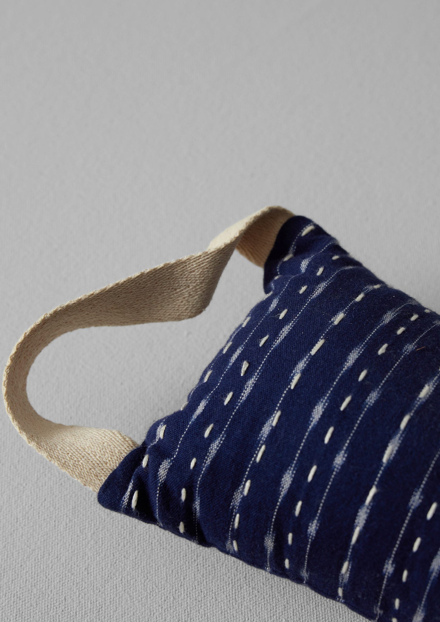 Hand Woven Ikat Cotton Draught Excluder | Midnight Stripe